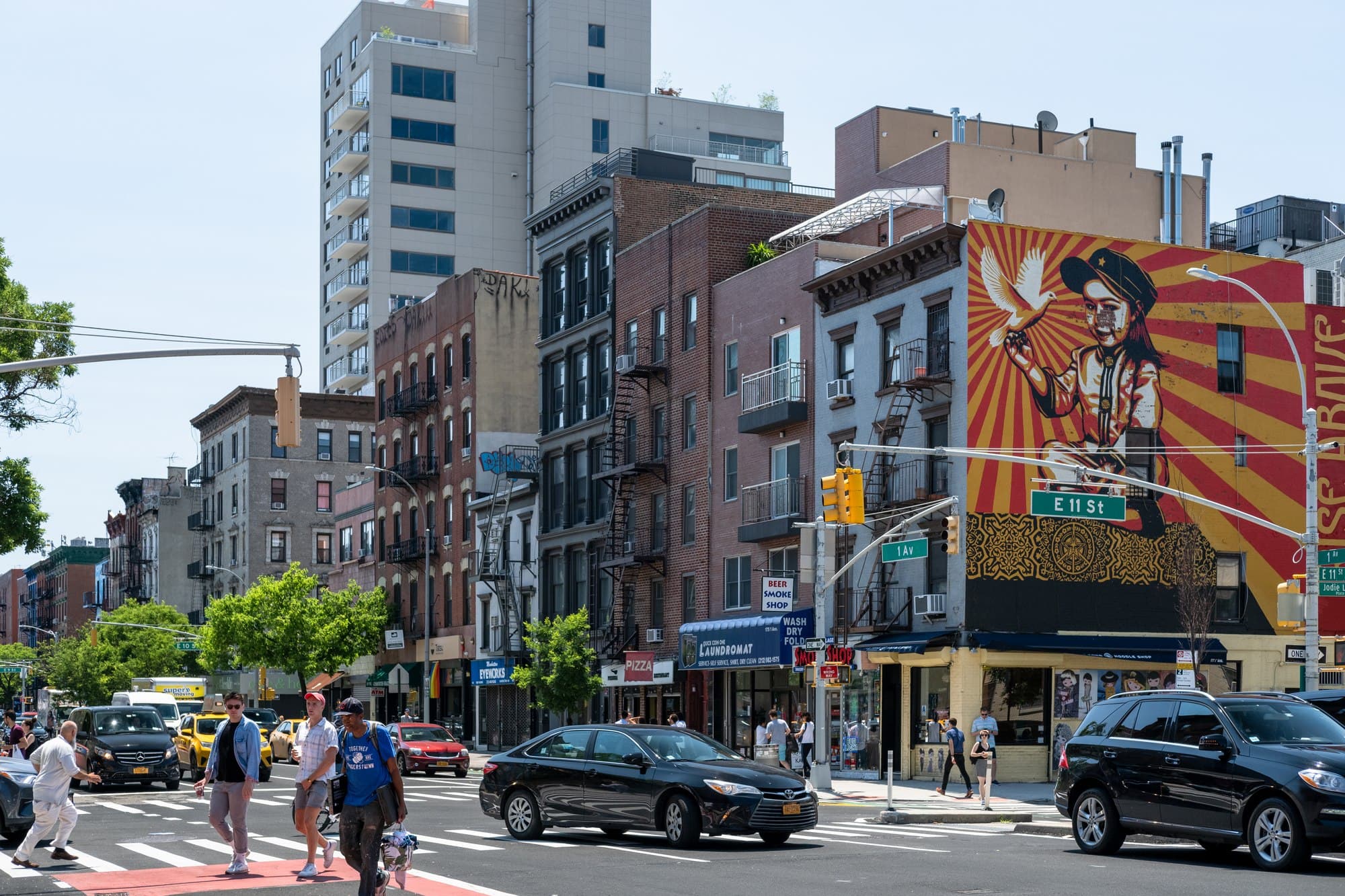 E 11th and 1st Av, East Village. I love all the colorful murals throughout the area.