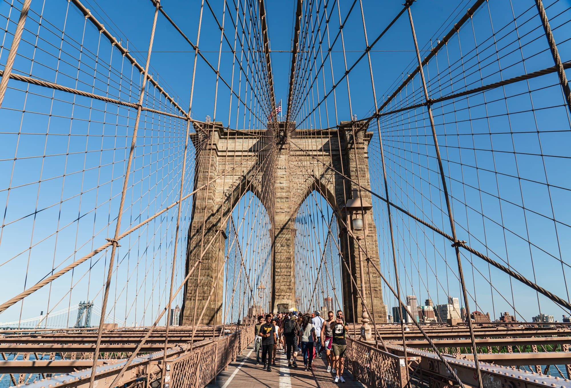 Walking across the Brooklyn Bridge to DUMBO